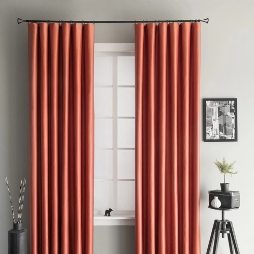 Luxurious burnt orange window curtains with a subtle sheen, enhancing a modern living room